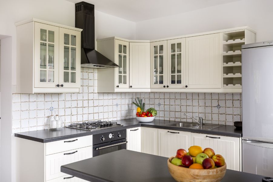 https://www.paintzen.com/wp-content/uploads/2020/04/white-kitchen-cabinets-shelving-paintzen.jpg