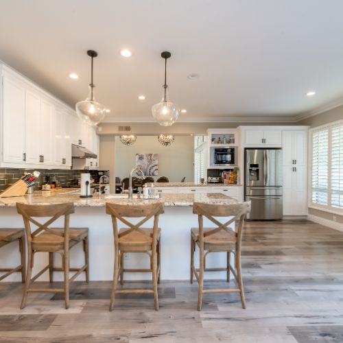 beige kitchen with white cabinets